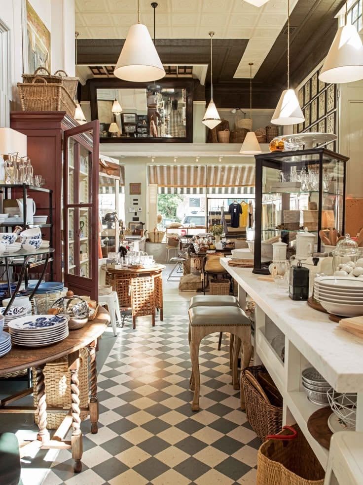 A retail boutique showroom merchandising home decor pieces