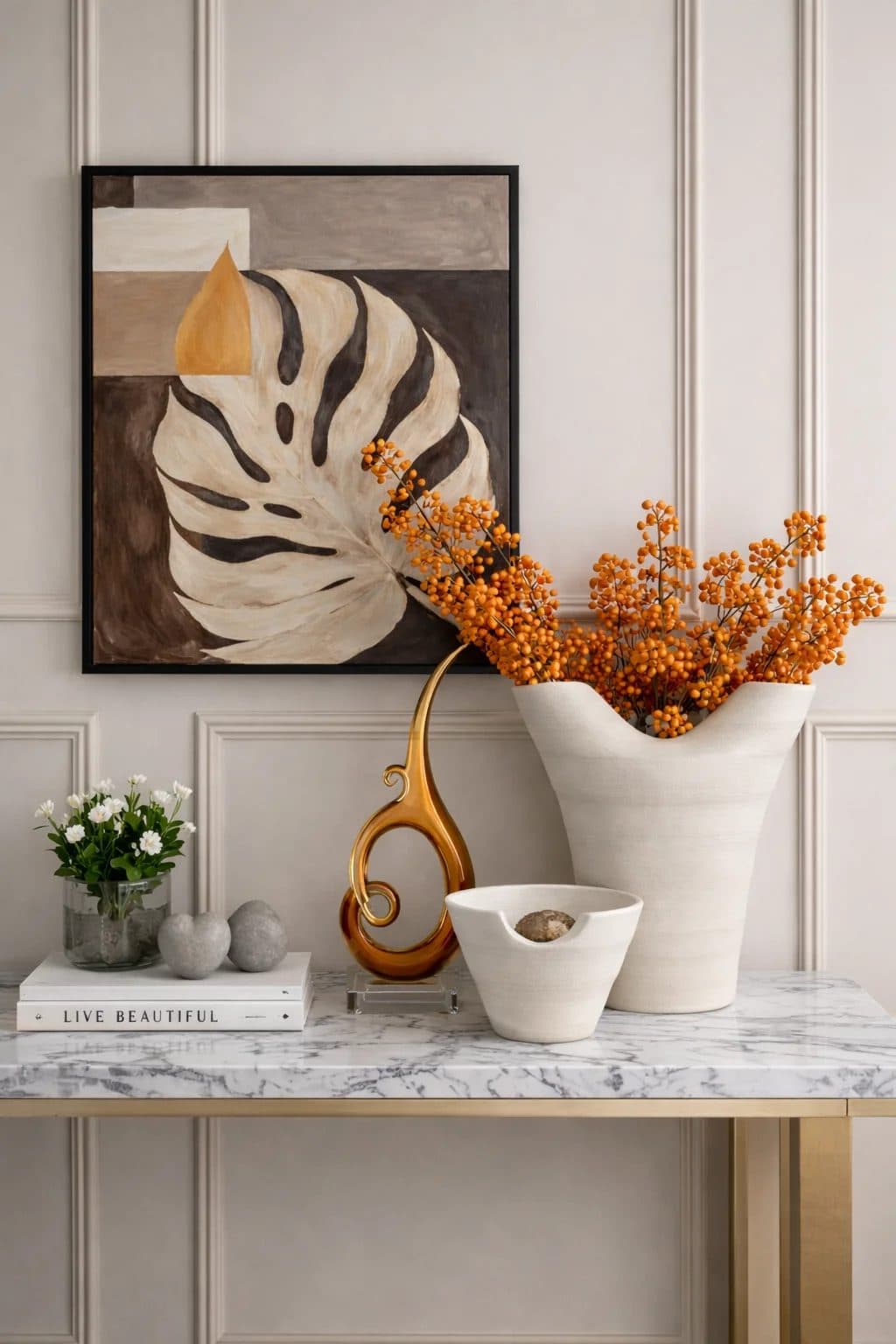 A styled console table vignette showing branded, retail-ready home decor